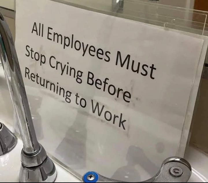 A sign that reads: "All Employees Must Stop Crying Before Returning to Work."